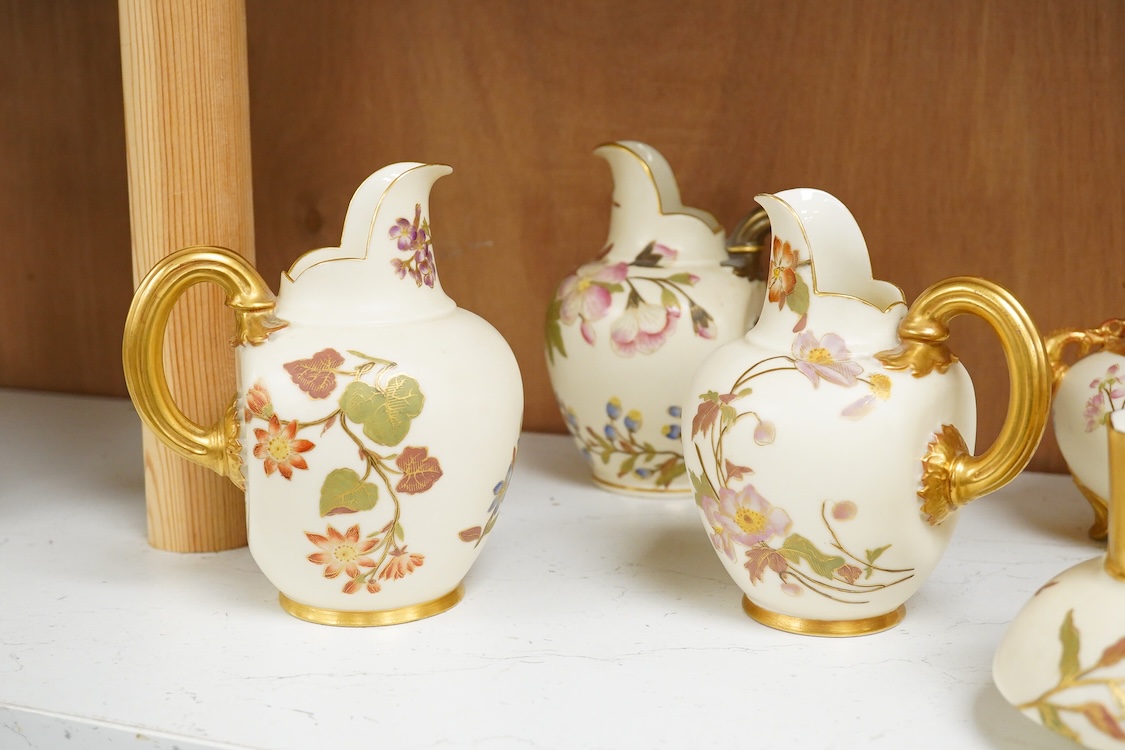 Three Royal Worcester blush ivory jugs, shape 1094, a pair of similar vases and two other Royal Worcester items, the jugs 14cm (7)